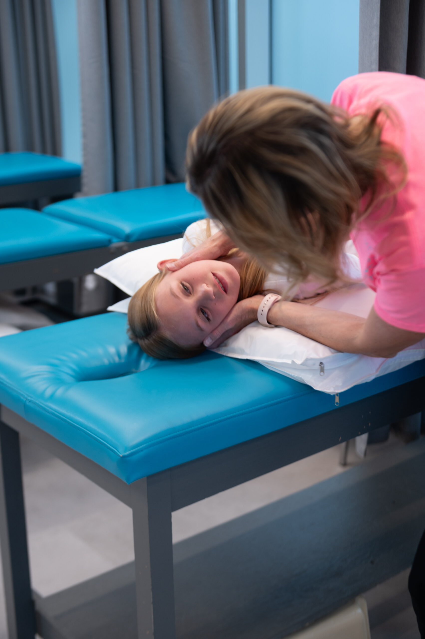 girl gets neck treatment for motor vehicle accident